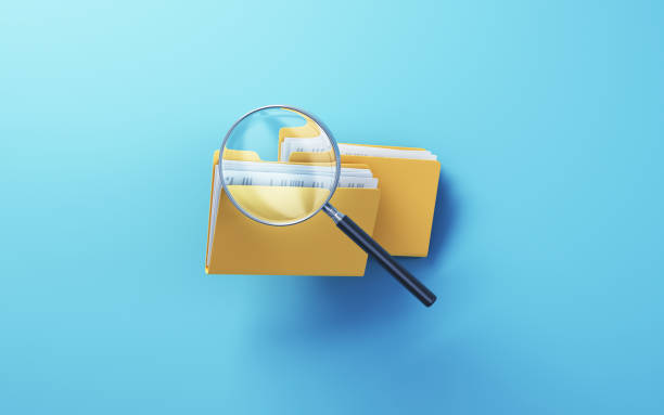 istock Yellow Folder and Documents with magnifying glass icon, sitting on Soft Blue background, Research concept 1907363581