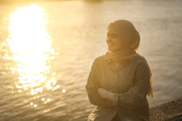 istock Arab woman enjoying a sunset 1907375269
