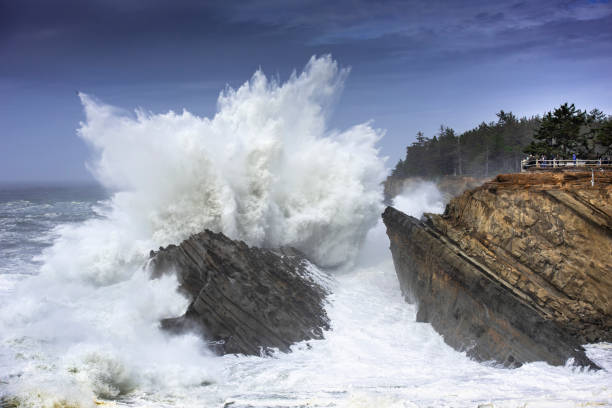 istock Oregon Coast Big Wave Crashes Into Headland 7 1907391917