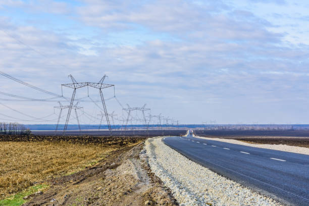 istock High voltage power line in a field on autumn 1907404585