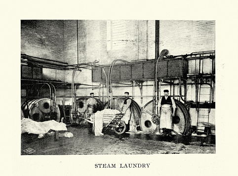 Vintage picture Workers cleaning sheet in the steam laundry of Royal Naval Hospital Haslar, Gosport, Hampshire, 1890s