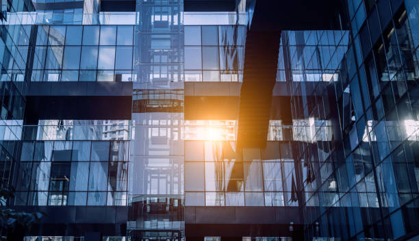 istock Modern office building close up in sunlight 1907463710