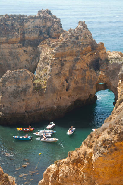 istock Ponta da Piedade cliffs & arches. Travel destination in Europe. 1907464779