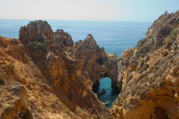 istock Ponta da Piedade cliffs & arches. Travel destination in Europe. 1907464788