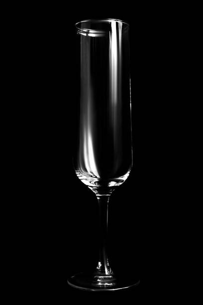 istock Champagne glass on black 1907469535
