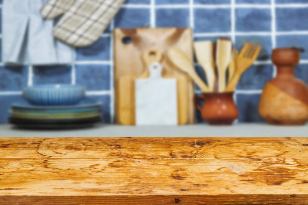 istock Empty wooden table with Kitchen utensils background , Mock up for display or montage of product,Banner or header for advertise on social media 1907481061