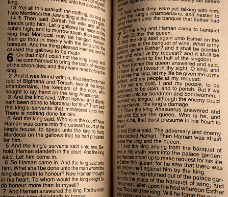 Part of a page from a bible open at Psalm 121, which starts “I will lift up mine eyes unto the hills, from whence cometh my help”.