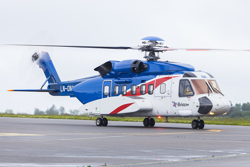 Bergen, Norway - June 13, 2022: Bristow Helicopters Sikorsky S-61N on the ramp at Bergen airport in Norway