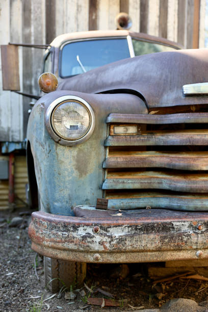 istock Rusty old pickup truck on the farm 1907491083