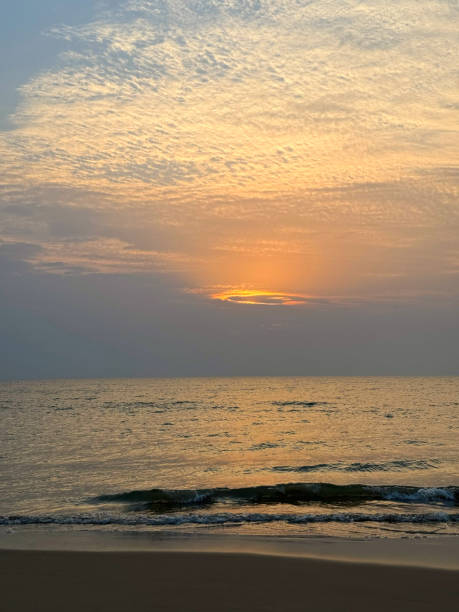 istock Ocean morning sunrise and cloudy sky 1907529269