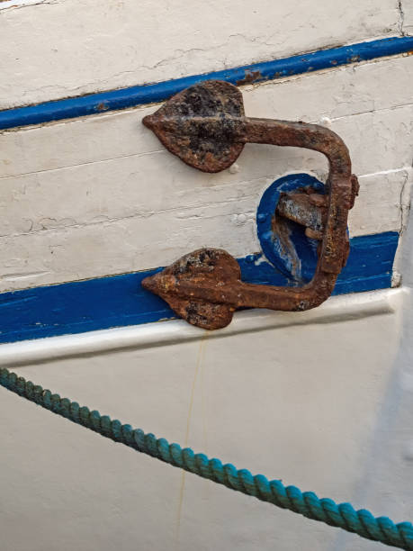 Close-up of a rusty anchor on an old trawler