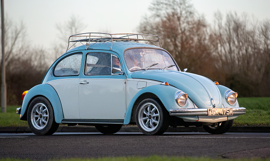 Stony Stratford,UK Jan 1st 2024. 1973 blue Volkswagen Beetle car arriving at Stony Stratford for the annual New Years Day vintage and classic vehicle festival.