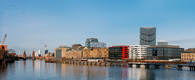 view across river spree from Kreuzberg to waterfront buildings in Friedrichshain