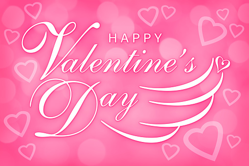Pink background with glowing hearts, bokeh and HAPPY VALENTINE'S DAY text. Can be used as a design for Valentine's day holiday greeting cards or posters.