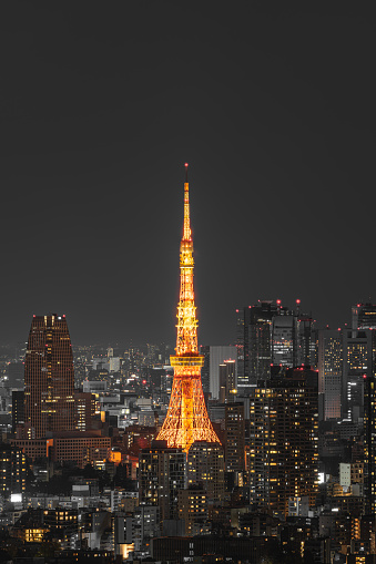he Tokyo Tower, [toːkʲoːtwː] is a communications and observation tower in the Shiba-koen district of Minato, Tokyo, Japan, built in 1958. At 332.9 meters (1,092 ft), it is the second-tallest structure in Japan. The structure is an Eiffel Tower-inspired lattice tower that is painted white and international orange to comply with air safety regulations.