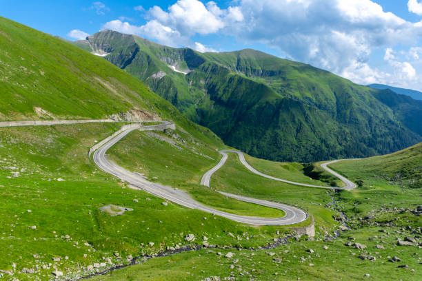 Winding road among green mountains