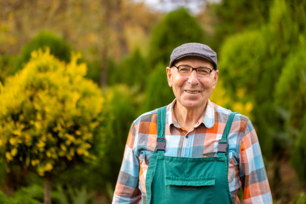 istock Smiling Senior Gardener Portrait 1907767465