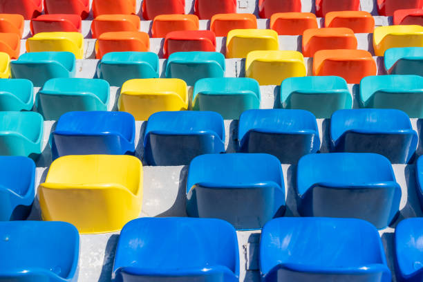 istock Colorful seats in a stadium arena. 1907783452