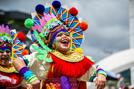 Portrait of woman (passista) celebrating and dancing at brazilian carnival