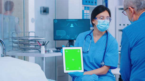 istock Close up of green screen tablet 1907802081