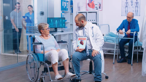 istock Coronary artery disease explanation from doctor 1907803633