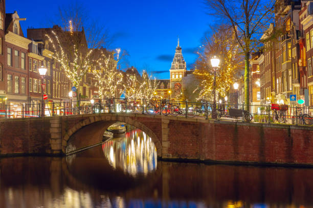 istock Amsterdam canal with dutch houses 1907805746