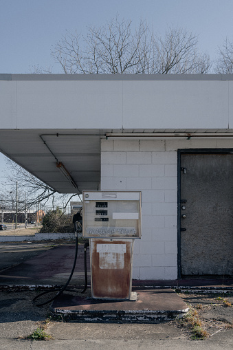 An abandoned gas pump and station in downtown Lancaster, South Carolina