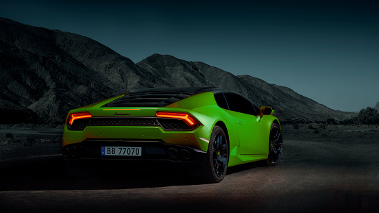 Green Lamborghini Huracan. Electronic assembly with Moroccan landscape. Oslo, Norway, 03.06.2016