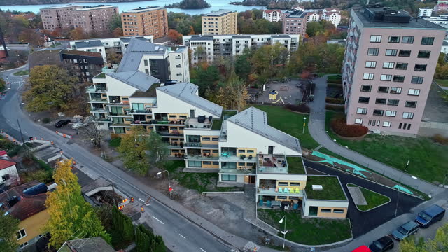Aerial view of sloping roof houses create scenic charming Swedish neighborhood