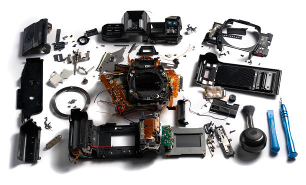 istock Broken and disassembled DSLR photo camera. 1907965696