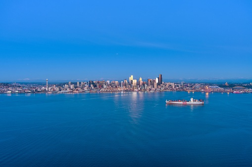 Aerial view of the Seattle, Washington waterfront skyline on Elliot Bay at sunset in December