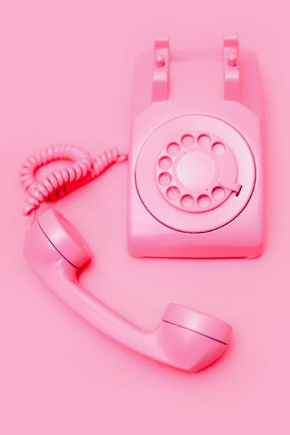 istock Retro Pink Rotary Telephone on Pink Background 1908000522