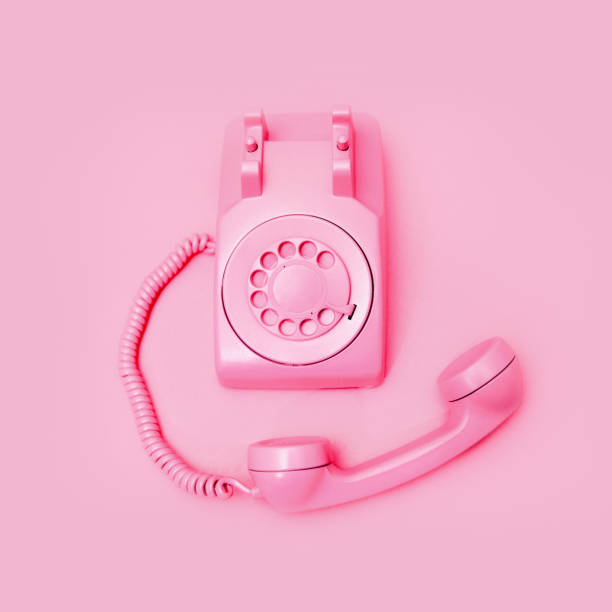 istock Retro Pink Rotary Telephone on Pink Background 1908001567