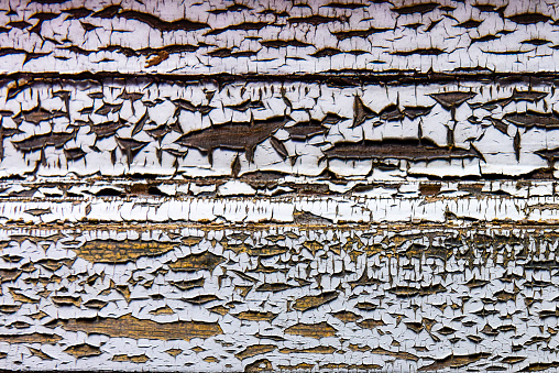 Detail of an old wood with cracked paint