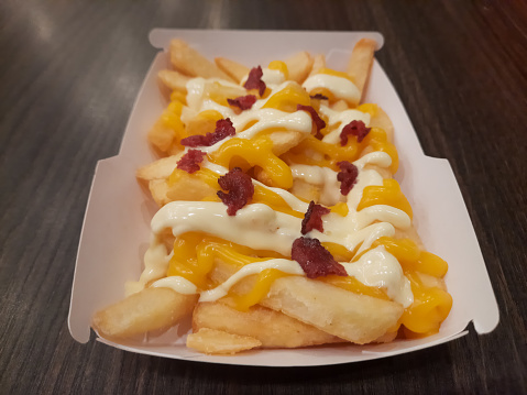 Cheesy Rasher Fries - Fresh Crunchy Fries With Cheese Sauce And Rashers Topping. Snack Menu.