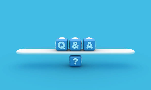 istock Seesaw with Q&A Buzzword Cubes 1908046333