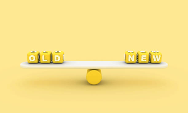 istock Seesaw with OLD NEW Buzzword Cubes 1908046334