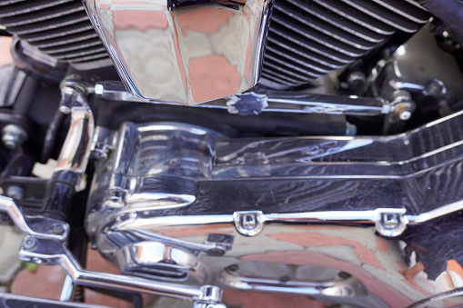 Motorcycle with nickel-plated engine, close up photo