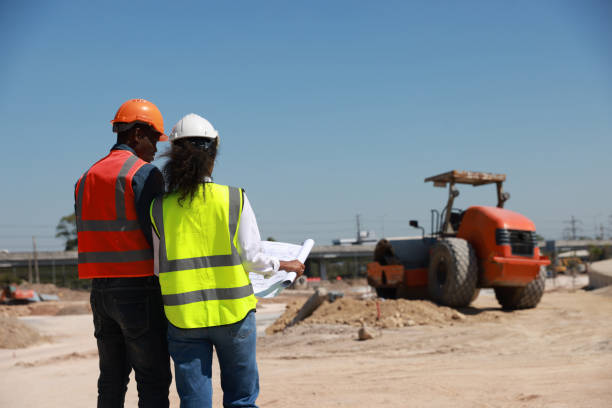 istock Coworkers doing a meeting in a construction site 1908142140