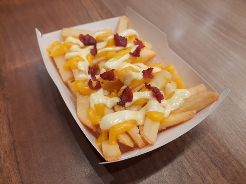 Cheesy Rasher Fries - Fresh Crunchy Fries With Cheese Sauce And Rashers Topping. Snack Menu.