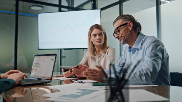 istock Business team discussing ideas on meeting closeup. Briefing cooperation concept 1908217737
