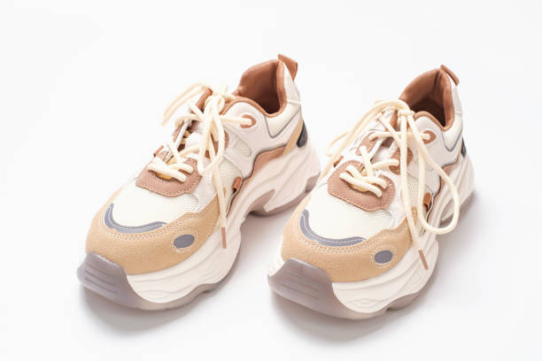 istock Pair of stylish sneakers on white background close-up. 1908226909