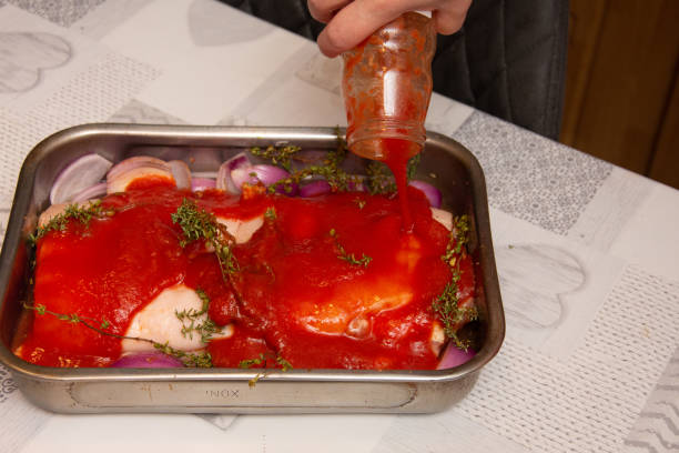istock Pork belly steak seasoned with thyme, red onion, garlic and tomato sauce 1908233021