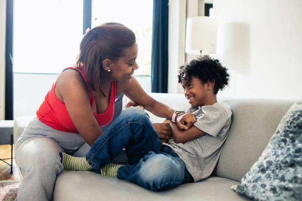 istock Young boy enjoys the time spent with his parent 1908244408