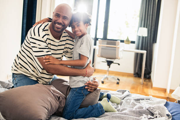 istock Young boy enjoys the time spent with his parent 1908244434