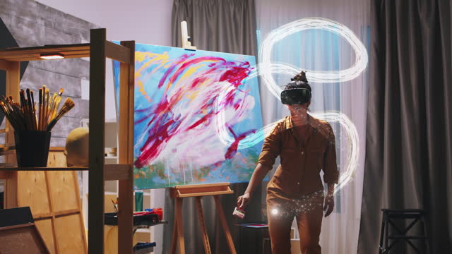 Female painter using virtual reality headset