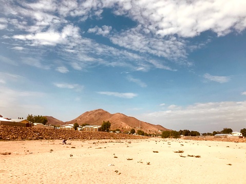 In this photo we see an expanse of sand like a desert yet it is indeed a lake that has just been completely dried up because of the dry season in the Maroua region of Cameroon.