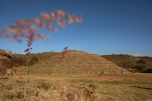 Afternoon view of the ancient circular pyramids of Guachimontones, dating back over 2300 years old, found above the city of Teuchitlán, Jalisco, Mexico.