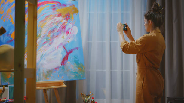 istock Taking photo of painting masterpiece 1908311395