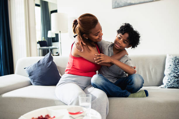 istock Young boy enjoys the time spent with his parent 1908314051